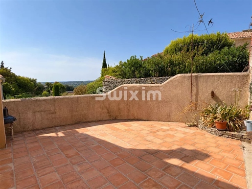 Maison de village avec terrasse, vue dégagée et garage